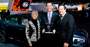 Michael Sprague, EVP marketing & communication Kia Motors America accepts trophy for 2014 International Car of the Year